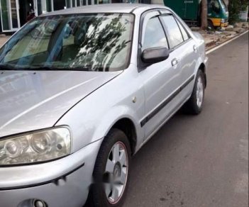 Ford Laser   2002 - Cần bán xe Ford Laser năm 2002, màu bạc, xe nhập chính chủ