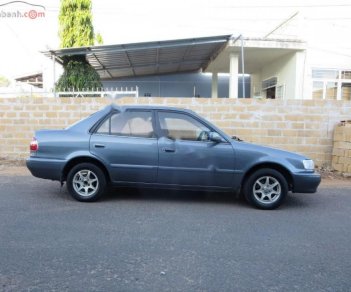 Toyota Corolla GLi 1.6 MT 1998 - Cần bán xe Toyota Corolla GLI ngay chủ, xe số tay, màu xám không trầy xước