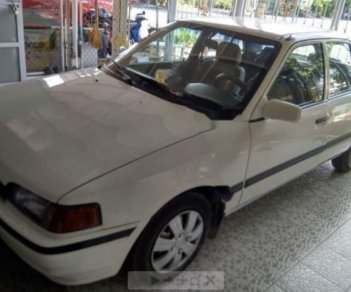 Mazda 323 1.6 MT 1995 - Cần bán xe Mazda 323 1.6 MT năm sản xuất 1995, màu trắng, giá chỉ 48 triệu