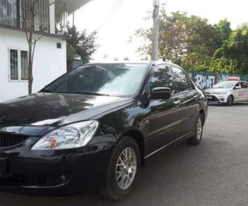 Mitsubishi Lancer 2004 - Cần bán xe Mitsubishi Lancer đời 2004, màu đen