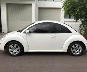 Volkswagen New Beetle 1.6AT 2009 - Cần bán Volkswagen New Beetle 1.6AT 2009, màu trắng, xe nhập, giá 490tr