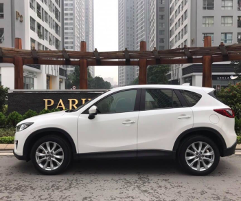 Mazda CX 5 2.0 2015 - Cần bán xe Mazda CX 5 sản xuất 2015 màu trắng, giá chỉ 768 triệu