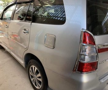 Toyota Innova 2015 - Cần bán xe Toyota Innova năm sản xuất 2015, màu bạc