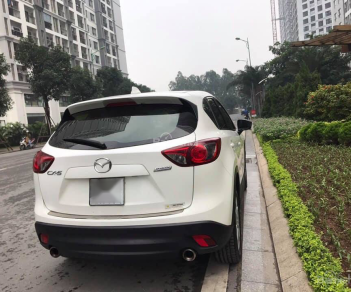 Mazda CX 5 2.0 2015 - Cần bán xe Mazda CX 5 sản xuất 2015 màu trắng, giá chỉ 768 triệu