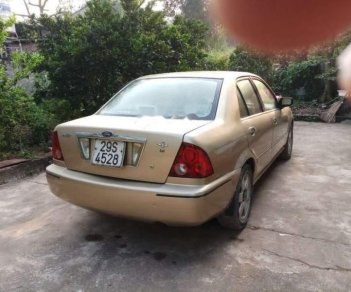 Ford Laser 2002 - Cần bán xe Ford Laser 2002, màu vàng, nhập khẩu, 152tr