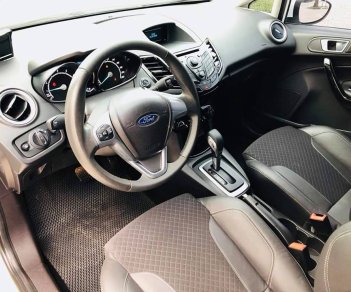 Ford Fiesta 1.5AT 2016 - Cho ra đi em Ford Fiesta 1.5AT 2016 màu trắng, 5 cửa, đẹp hoàn hảo