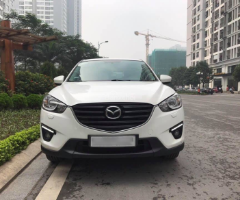 Mazda CX 5 2.0 2015 - Cần bán xe Mazda CX 5 sản xuất 2015 màu trắng, giá chỉ 768 triệu