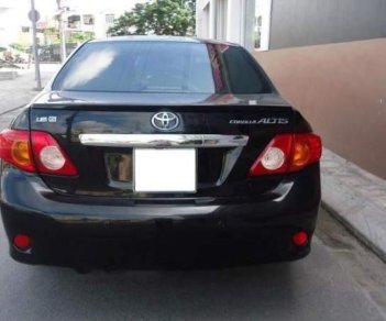 Toyota Corolla altis 2009 - Cần bán lại xe Toyota Corolla Altis đời 2009, màu đen số sàn