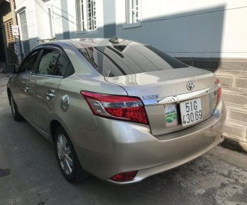 Toyota Vios 1.5G AT 2017 - Cần bán xe Toyota Vios 1.5G AT đời 2017, màu vàng cát