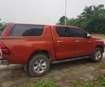 Toyota Hilux   3.0 4x4 AT 2016 - Bán xe Toyota Hilux 3.0 4x4 AT năm 2016, màu đỏ chính chủ