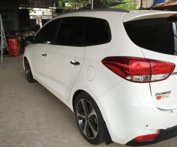 Kia Rondo   2015 - Cần bán gấp Kia Rondo đời 2015, màu trắng, đã đi 39800km