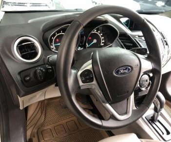 Ford Fiesta 1.5AT Titanium 2015 - Bán Ford Fiesta 1.5AT Titanium màu bạc 2015, full options xe cực mới