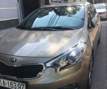 Kia K3 2014 - Bán xe Kia K3 năm sản xuất 2014, màu vàng cát