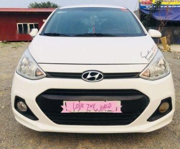 Hyundai Grand i10   2015 - Cần bán lại xe Hyundai Grand i10 năm 2015, màu trắng, xe nhập