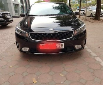 Kia Cerato   1.6AT 2016 - Cần bán gấp Kia Cerato 1.6AT năm 2016, màu đen số tự động, giá chỉ 589 triệu