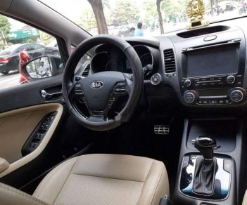 Kia Cerato   1.6AT 2016 - Cần bán gấp Kia Cerato 1.6AT năm 2016, màu đen số tự động, giá chỉ 589 triệu