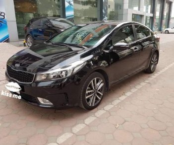 Kia Cerato   1.6AT 2016 - Cần bán gấp Kia Cerato 1.6AT năm 2016, màu đen số tự động, giá chỉ 589 triệu