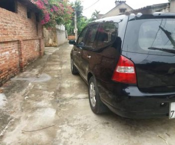 Nissan Grand livina  MT 2010 - Cần bán xe Nissan Livina đời 2010, màu đen, xe đẹp