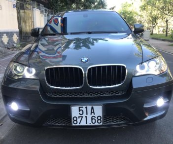 BMW X6 3.5si 2009 - Bán ô tô BMW X6 xdrive 3.5si năm 2009, màu xanh lục, giá 820 triệu nhập khẩu