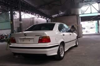 BMW 3 Series 320i 1997 - Cần bán BMW 3 Series 320i đời 1997, màu trắng, nhập khẩu, giá 150tr