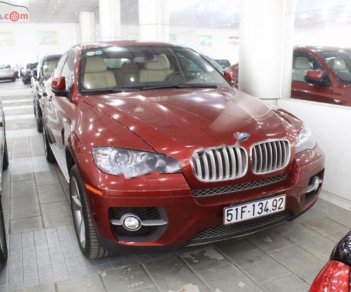 BMW X6 xDrive50i 2009 - Bán BMW X6 xDrive50i đời 2009, màu đỏ, xe nhập