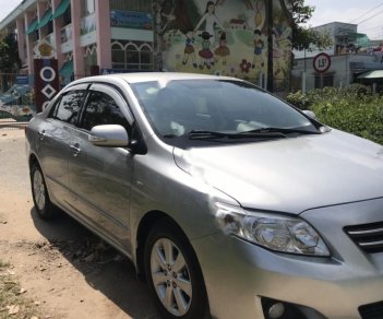 Toyota Corolla altis 1.8G 2009 - Bán xe Toyota Corolla altis 1.8G năm sản xuất 2009, màu bạc như mới, 409 triệu