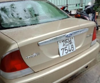 Ford Laser Delu 1.6 MT 2001 - Cần bán Ford Laser Delu 1.6 MT sản xuất 2001, màu ghi vàng, giá tốt