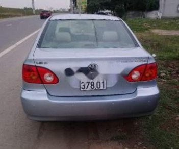 Toyota Corolla altis 2002 - Cần bán xe Toyota Corolla Altis đời 2002, màu bạc