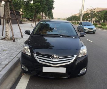 Toyota Vios 1.5E 2011 - Cần bán gấp chiếc Toyota Vios 1.5E 2011 số sàn, màu đen, chính chủ gia đình tôi