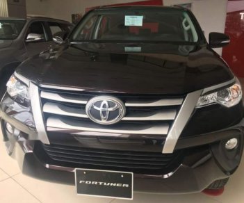 Toyota Fortuner 2.4 MT 2018 - Cần bán lại xe Toyota Fortuner 2.4 MT năm sản xuất 2018, màu đen số sàn