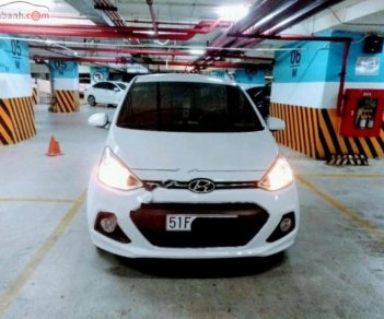 Hyundai Grand i10  1.2 AT 2016 - Bán Hyundai Grand i10 1.2 AT năm sản xuất 2016, màu trắng, nhập khẩu nguyên chiếc còn mới giá cạnh tranh