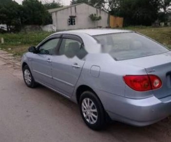 Toyota Corolla altis 2002 - Cần bán xe Toyota Corolla Altis đời 2002, màu bạc