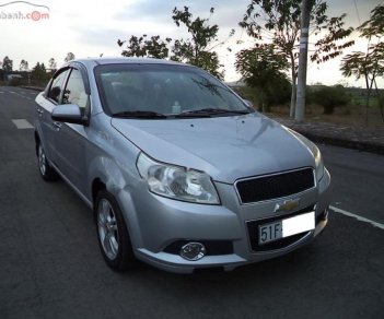 Chevrolet Aveo LT 1.5 MT 2015 - Cần bán gấp Chevrolet Aveo LT 1.5 MT đời 2015, màu bạc như mới