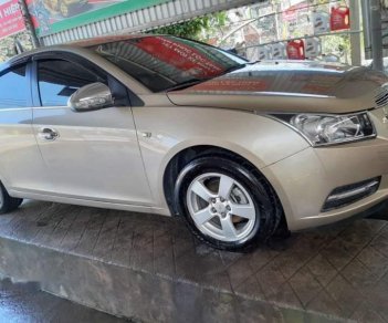 Chevrolet Cruze   2013 - Bán Chevrolet Cruze sản xuất 2013, màu vàng số sàn