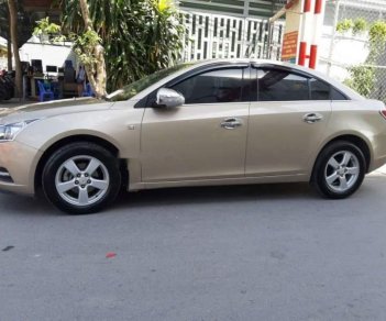 Chevrolet Cruze   2013 - Bán Chevrolet Cruze sản xuất 2013, màu vàng số sàn