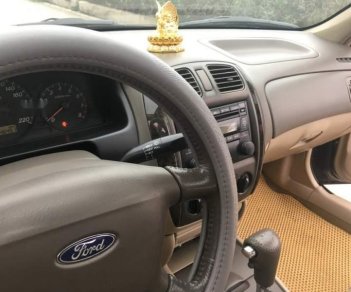 Ford Laser   2004 - Bán Ford Laser năm sản xuất 2004, màu đen chính chủ, giá tốt