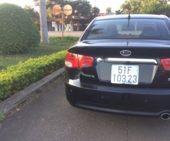 Kia Forte 2010 - Cần bán Kia Forte 2010, màu đen xe gia đình