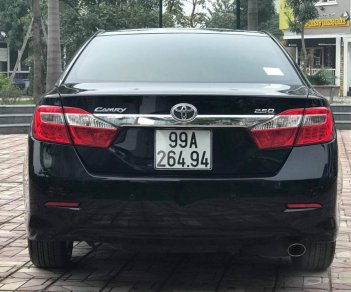 Toyota Camry 2.5Q 2015 - Cần bán lại xe Toyota Camry đời 2015, màu đen còn mới, giá tốt 976tr