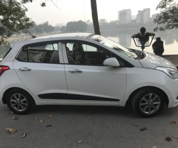 Hyundai Grand i10 1.2AT 2016 - Bán xe i10 1.2AT đời 2016, màu trắng, nhập khẩu