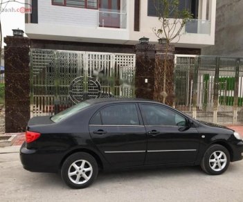 Toyota Corolla 2003 - Bán ô tô Toyota Corolla năm 2003, màu đen