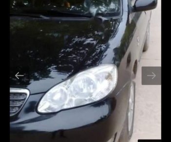 Toyota Corolla altis 2004 - Cần bán lại xe Toyota Corolla altis sản xuất 2004, màu đen, giá tốt