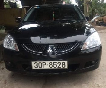 Mitsubishi Lancer 2004 - Bán Mitsubishi Lancer sản xuất 2004, màu đen số tự động, giá chỉ 225 triệu