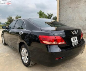 Toyota Camry 2.4G 2007 - Bán Toyota Camry 2.4G sản xuất 2007, màu đen còn mới