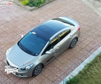 Kia K3 2014 - Bán ô tô Kia K3 đời 2014, màu vàng như mới, 535tr