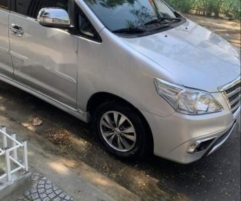 Toyota Innova 2015 - Cần bán gấp Toyota Innova sản xuất 2015, màu bạc