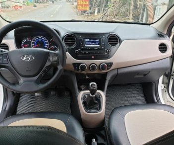 Hyundai Grand i10    1.0 MT 2014 - Cần bán gấp Hyundai Grand i10 1.0 MT năm 2014, màu trắng, xe nhập chính chủ