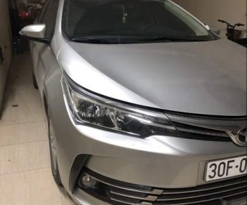 Toyota Corolla altis 1.8AT 2017 - Bán lại xe Toyota Corolla altis 1.8AT 2017, màu bạc chính chủ