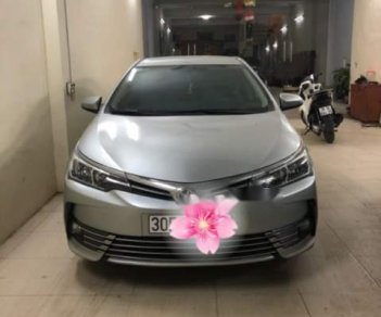 Toyota Corolla altis 1.8AT 2017 - Bán lại xe Toyota Corolla altis 1.8AT 2017, màu bạc chính chủ