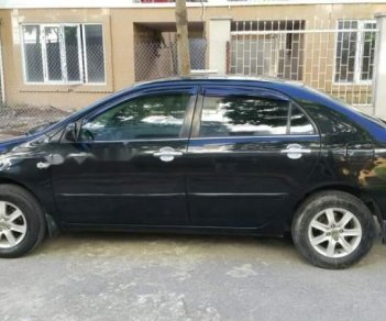 Toyota Corolla altis   2004 - Bán xe Toyota Corolla Altis, màu đen, đời 2004, số tay, nhiên liệu 7 lít, mới đi 12,0000 km