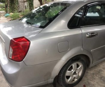 Daewoo Lacetti   2009 - Bán ô tô Daewoo Lacetti đời 2009, màu bạc xe gia đình